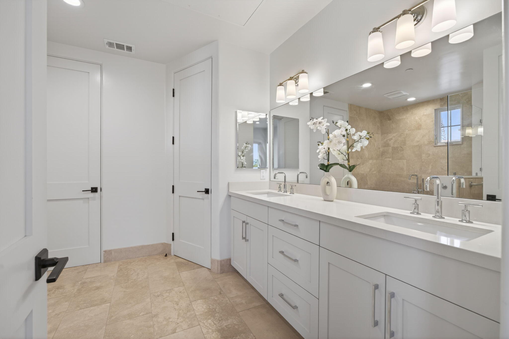 3718 State Street, Unit 139 Santa Barbara, CA 93105 - Photo 18 of 34 a bathroom with a double vanity sink mirror and double