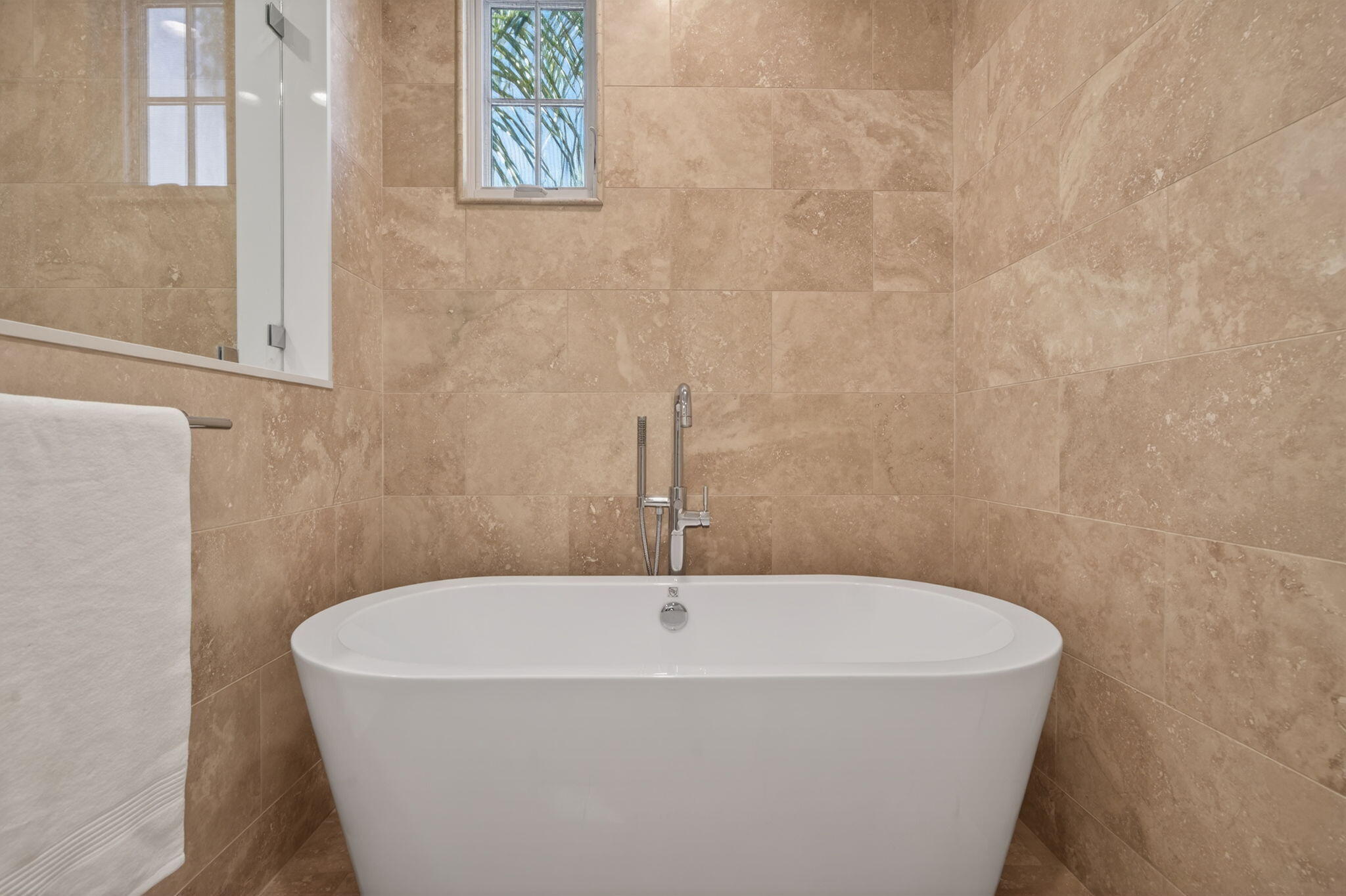 3718 State Street, Unit 139 Santa Barbara, CA 93105 - Photo 20 of 34 a white bath tub sitting in a bathroom