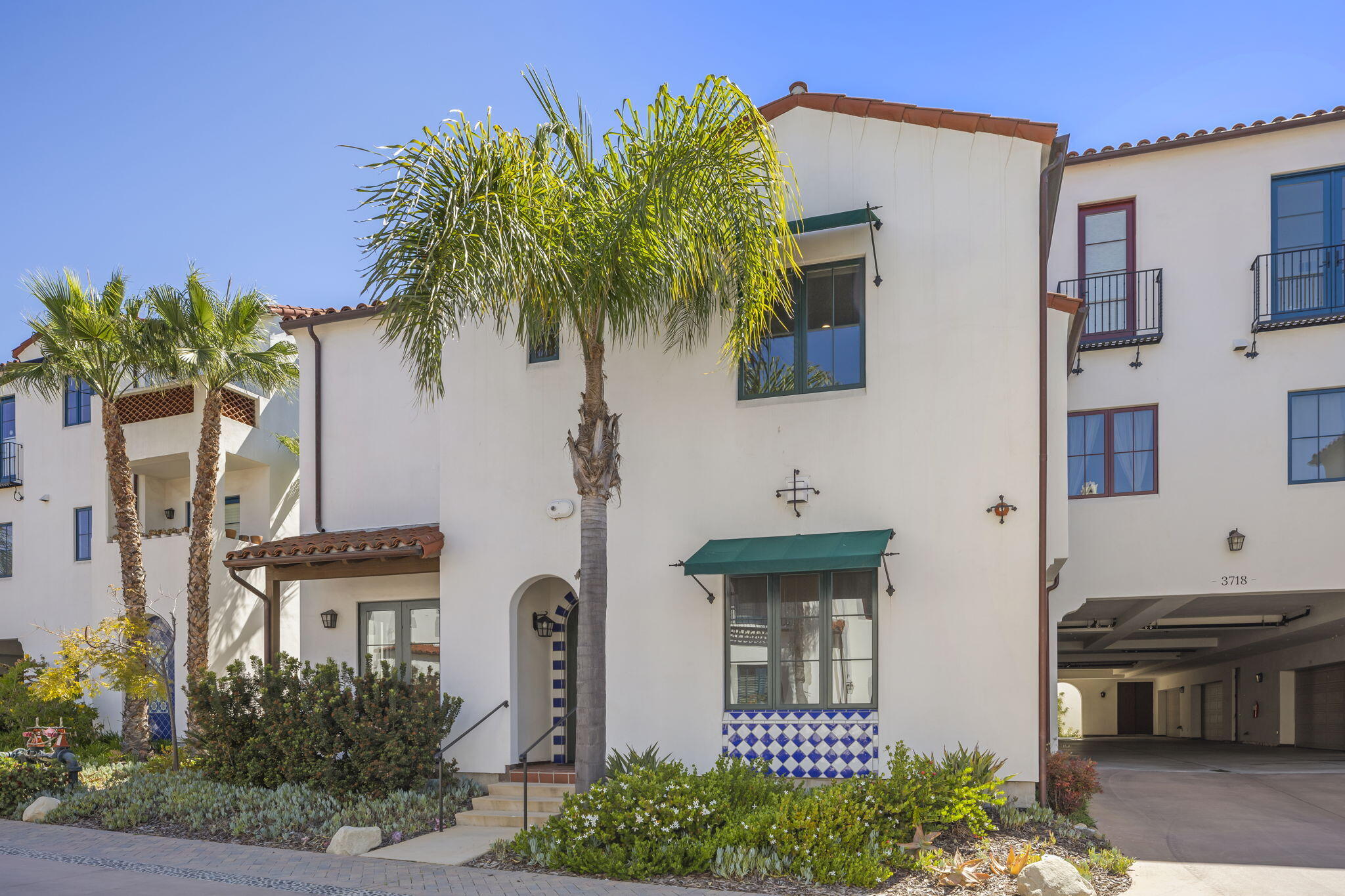 3718 State Street, Unit 139 Santa Barbara, CA 93105 - Photo 2 of 34 a front view of a house with garden