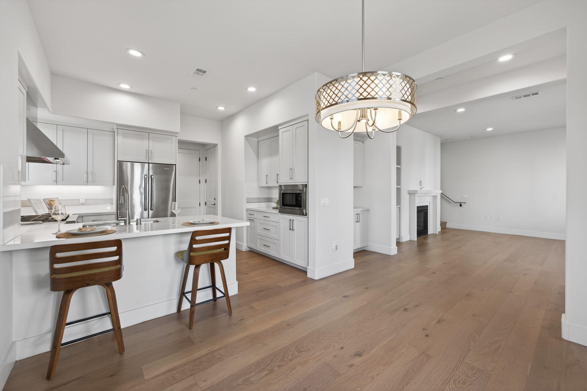 3718 State Street, Unit 139 Santa Barbara, CA 93105 - Photo 7 of 34 a kitchen with refrigerator and chairs