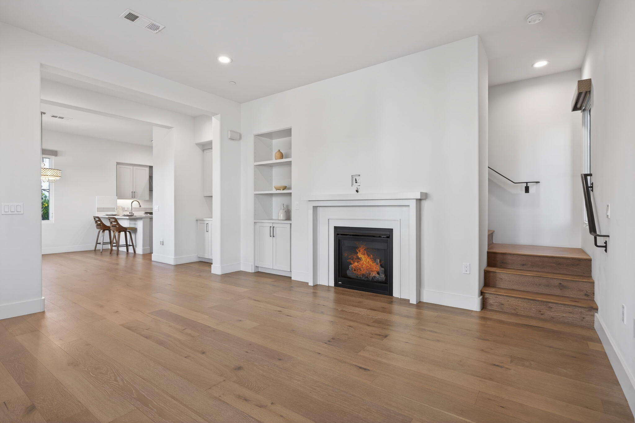 3718 State Street, Unit 139 Santa Barbara, CA 93105 - Photo 10 of 34 a view of a livingroom with wooden floor and a fireplace
