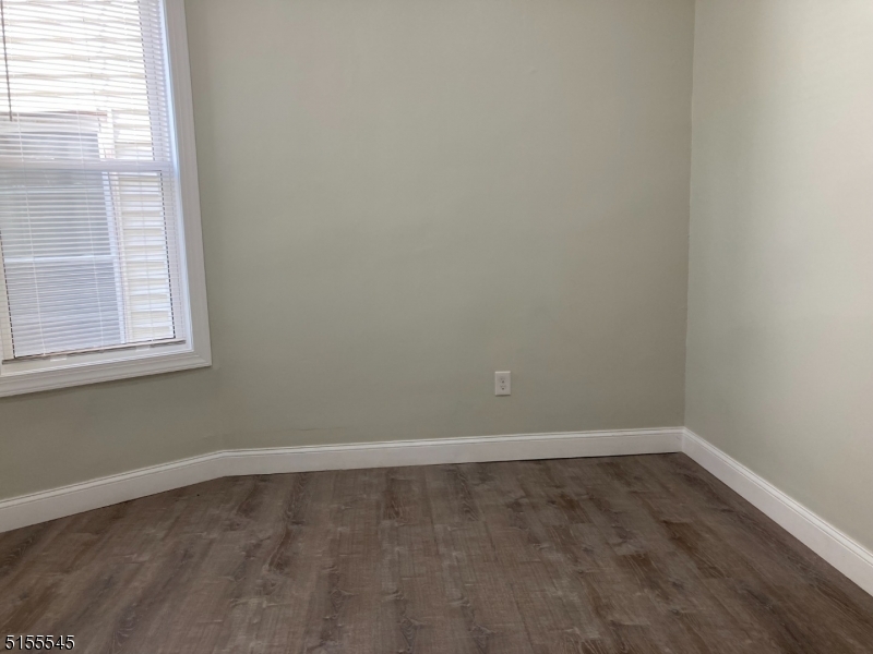 134 South 7th Street, Unit 2 Newark, NJ 07107 - Photo 11 of 13 an empty room with a window