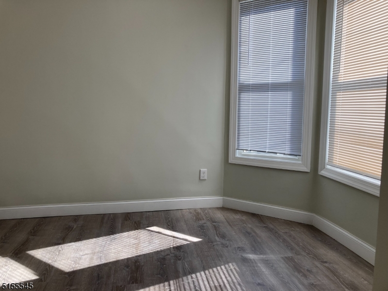 134 South 7th Street, Unit 2 Newark, NJ 07107 - Photo 7 of 13 a view of wooden floor in a room
