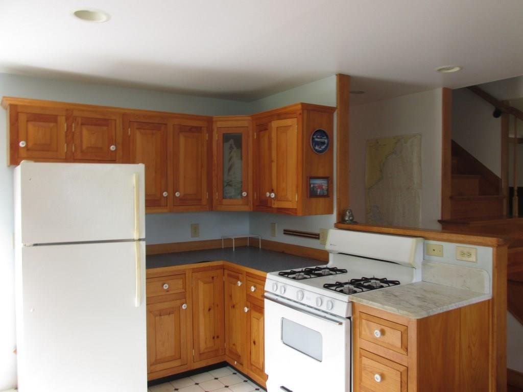 76 City Point Road Belfast, ME 04915 - Photo 5 of 34 Ample cabinets in kitchen. Gas range...