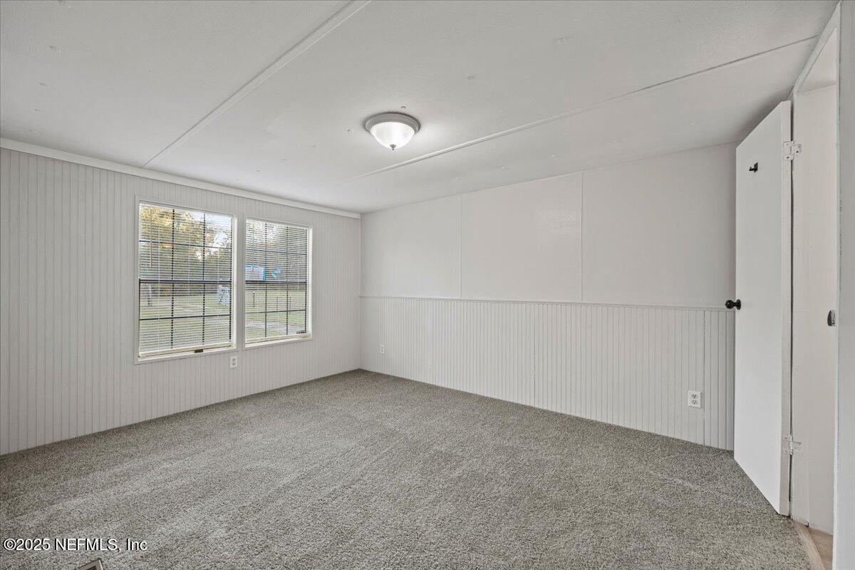 1480 Brangus Road Middleburg, FL 32068 - Photo 13 of 24 a view of an empty room with a window