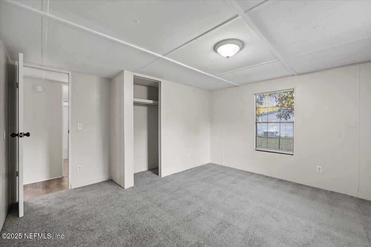 1480 Brangus Road Middleburg, FL 32068 - Photo 19 of 24 a view of an empty room with a window