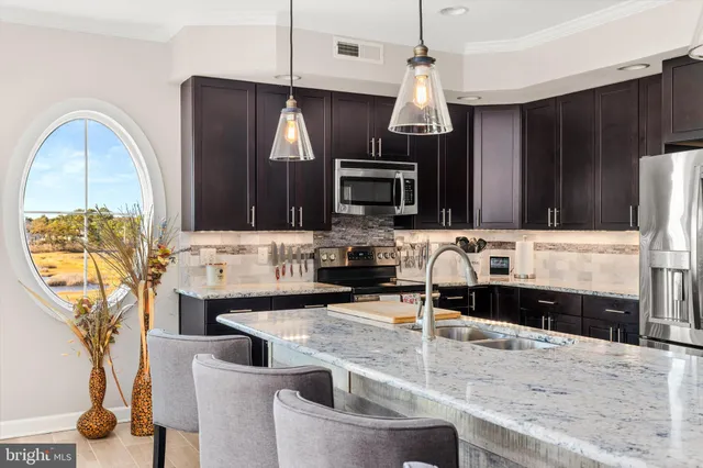 $985,000 | 37286 Lighthouse Road, Unit 210, Selbyville, DE 19975