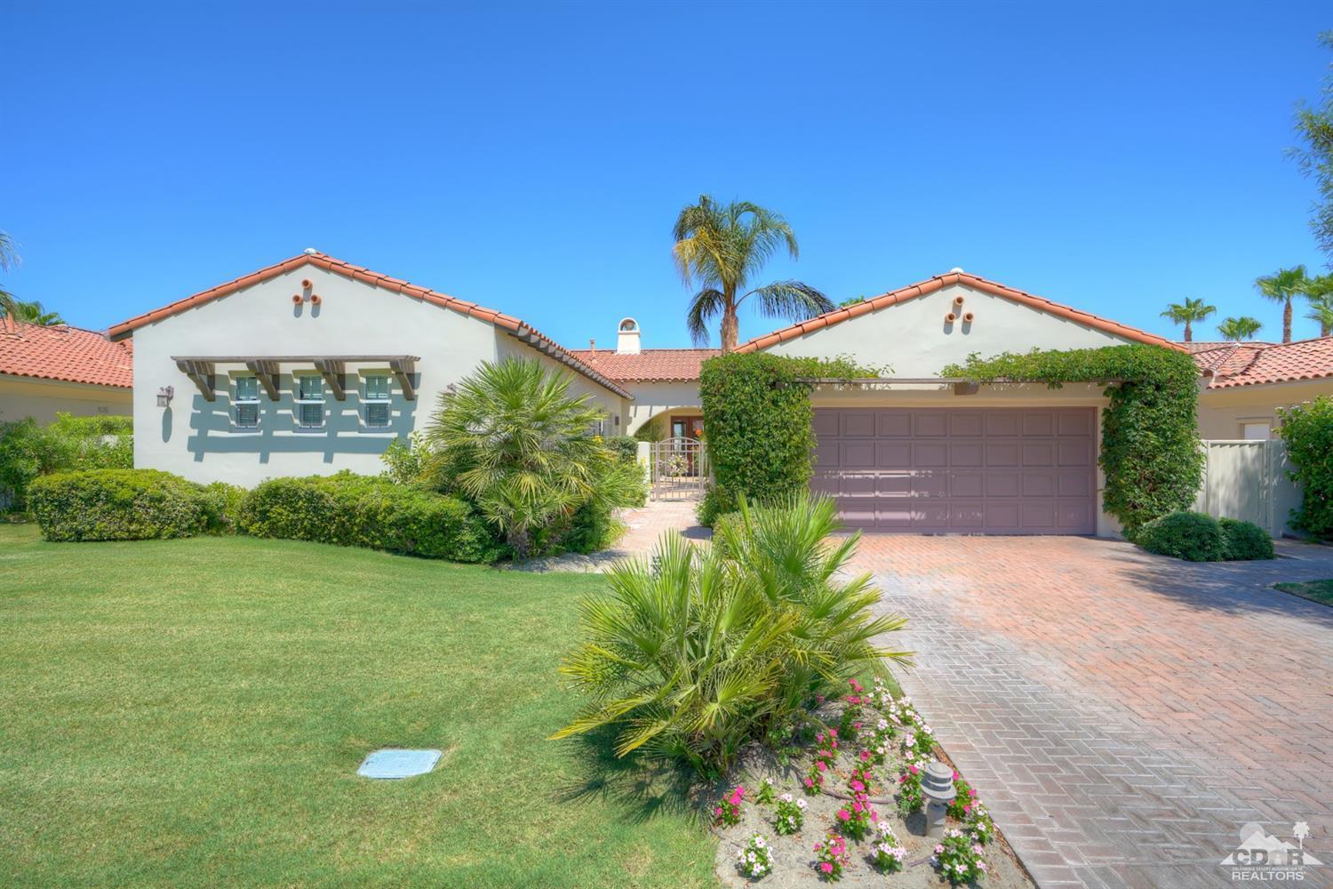329 Loch Lomond Road Rancho Mirage, CA 92270 - Photo 2 of 50 a front view of a house with garden