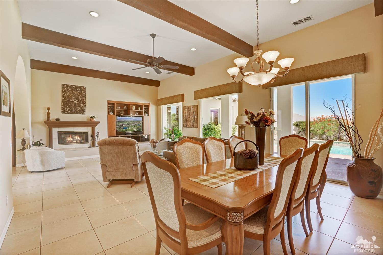 329 Loch Lomond Road Rancho Mirage, CA 92270 - Photo 13 of 50 a view of a dining room with furniture