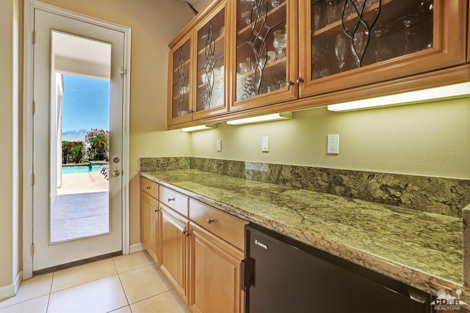 329 Loch Lomond Road Rancho Mirage, CA 92270 - Photo 20 of 50 a view of a kitchen cabinets and a sink