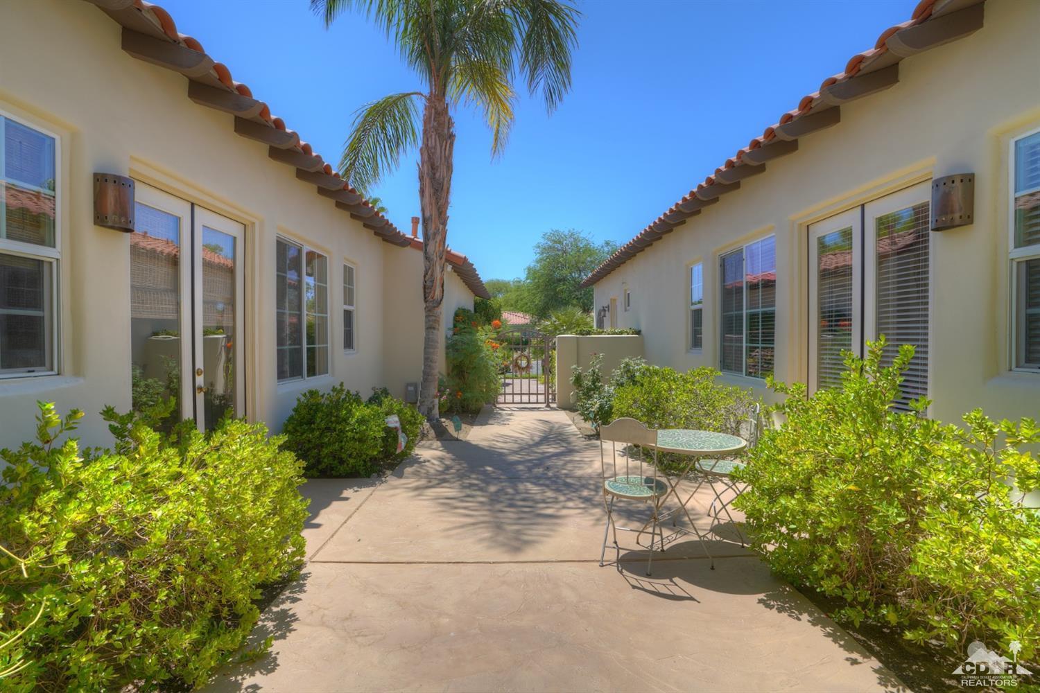 329 Loch Lomond Road Rancho Mirage, CA 92270 - Photo 4 of 50 a view of a house with a yard