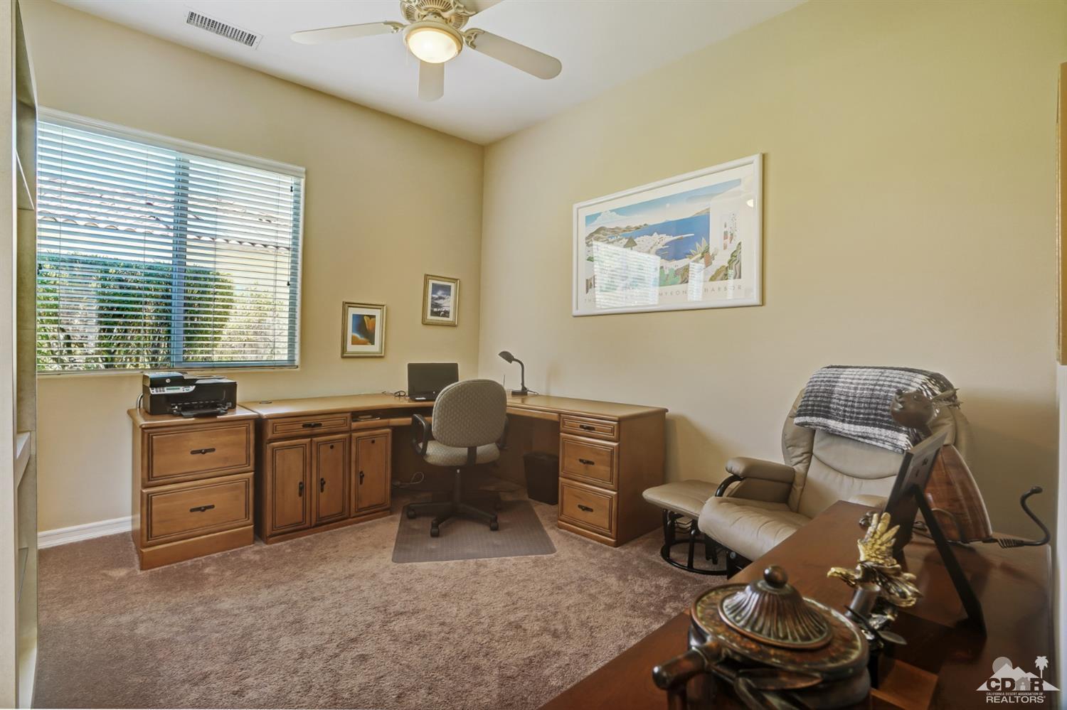 329 Loch Lomond Road Rancho Mirage, CA 92270 - Photo 33 of 50 a workspace with furniture