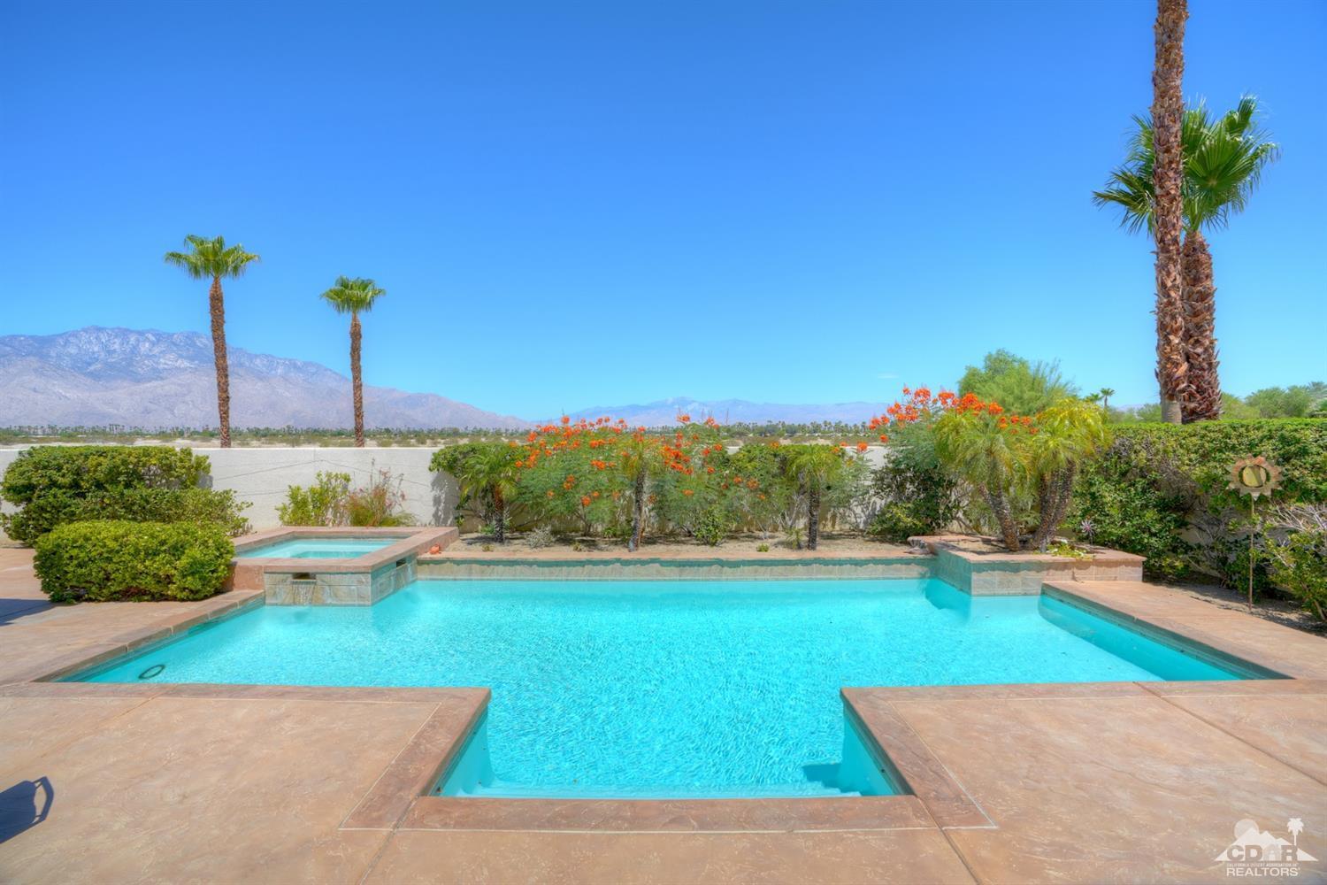 329 Loch Lomond Road Rancho Mirage, CA 92270 - Photo 35 of 50 a view of a swimming pool with a yard