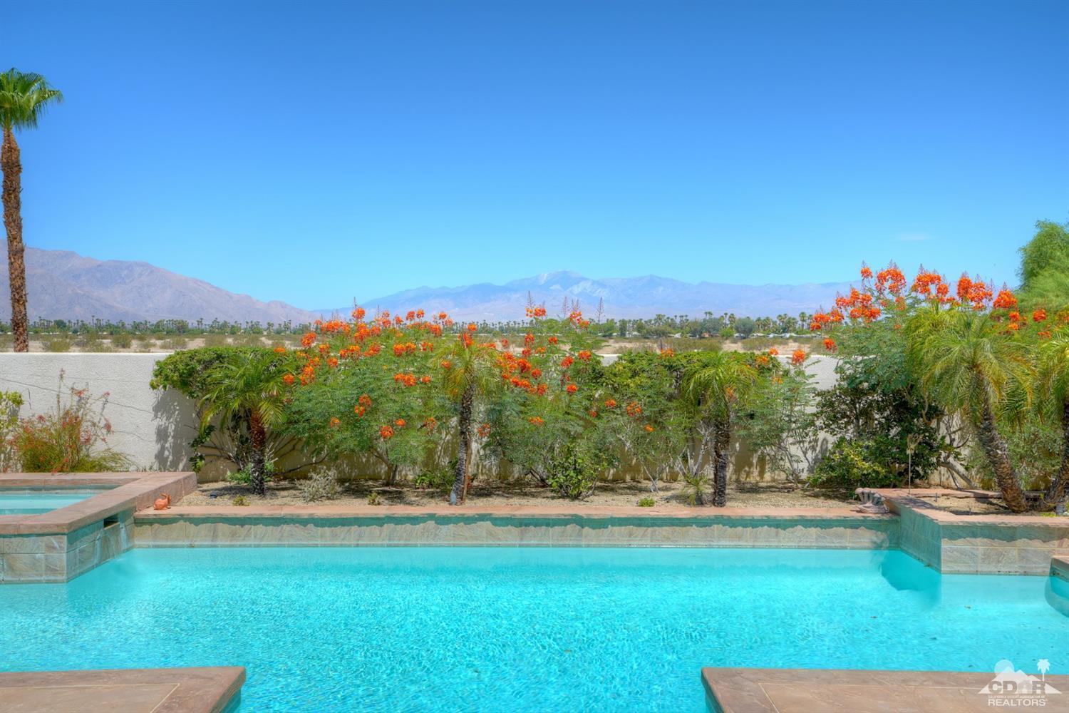 329 Loch Lomond Road Rancho Mirage, CA 92270 - Photo 36 of 50 a view of swimming pool and lake view