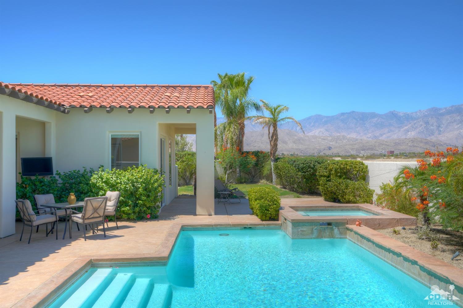 329 Loch Lomond Road Rancho Mirage, CA 92270 - Photo 38 of 50 a view of a house with swimming pool and sitting area