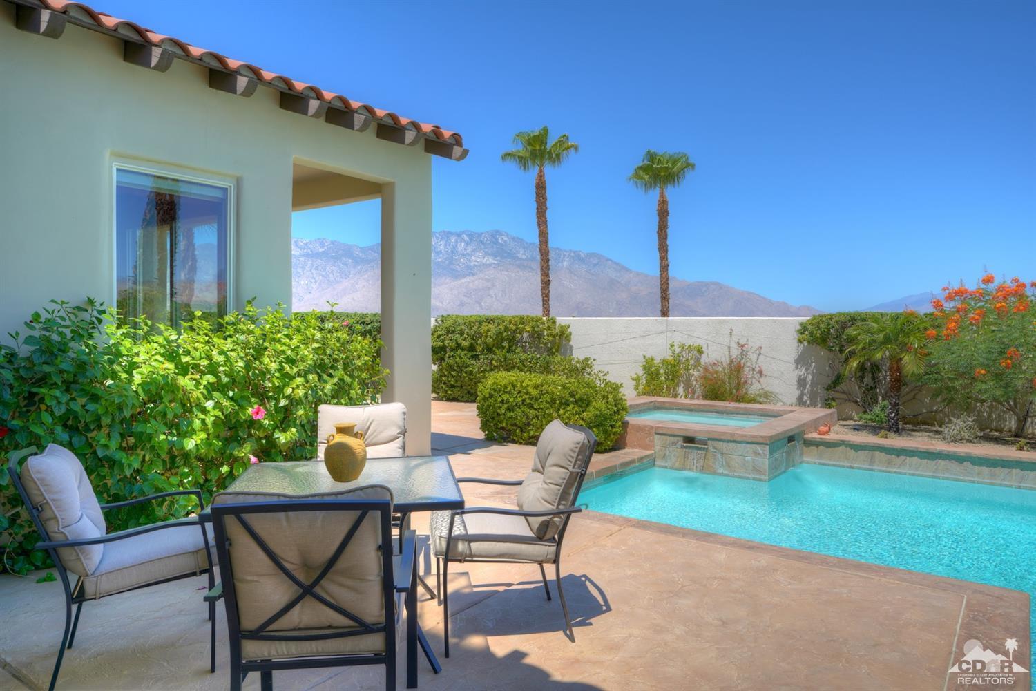 329 Loch Lomond Road Rancho Mirage, CA 92270 - Photo 45 of 50 a view of a patio with plants and table and chairs