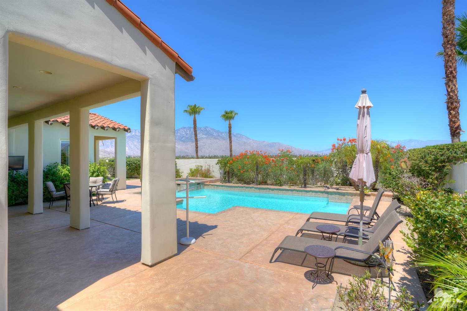 329 Loch Lomond Road Rancho Mirage, CA 92270 - Photo 48 of 50 a view of a patio with a yard