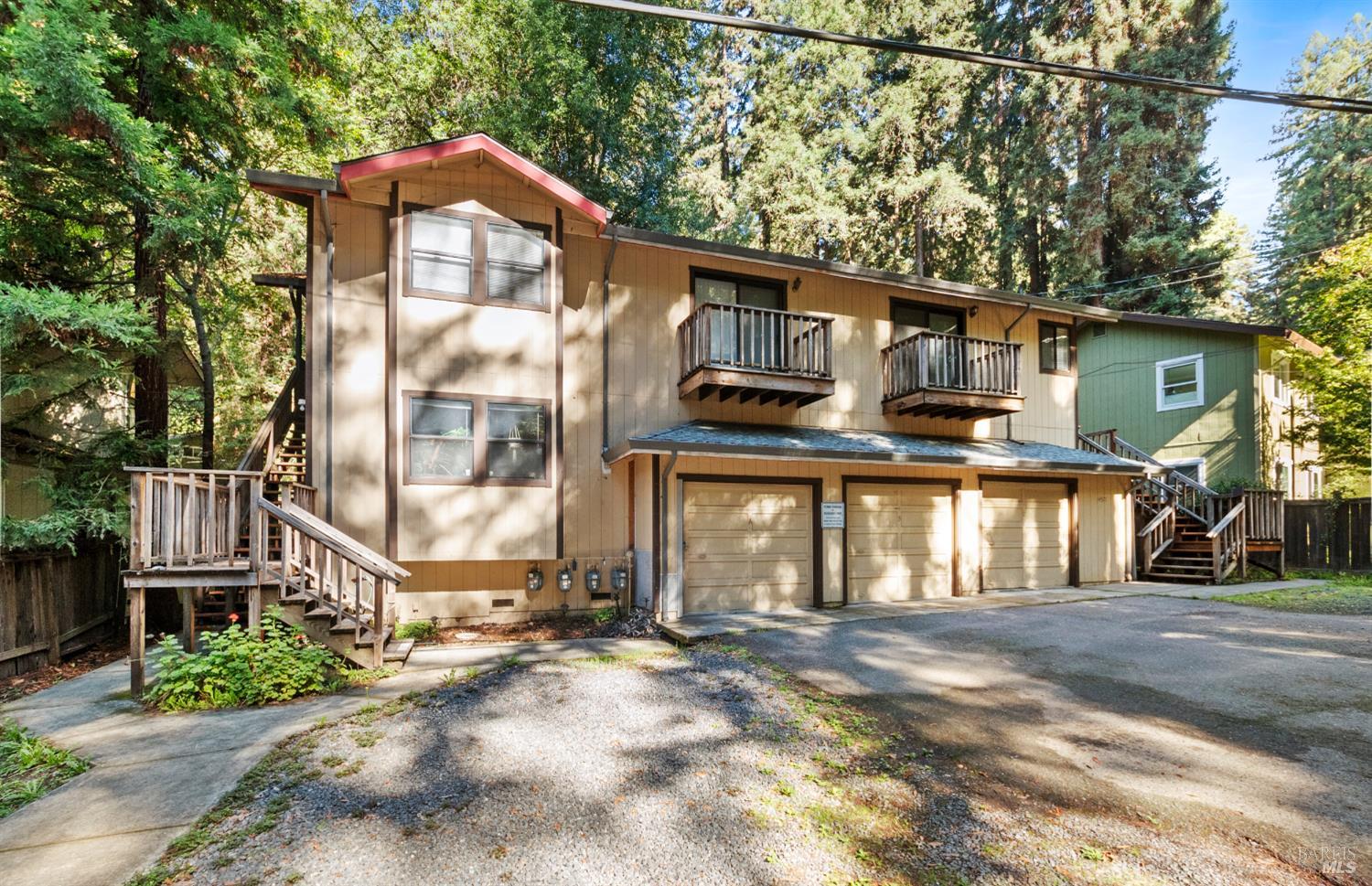 14571 Canyon 1 Road Guerneville, CA 95446 - Photo 22 of 37 a front view of a house with a yard