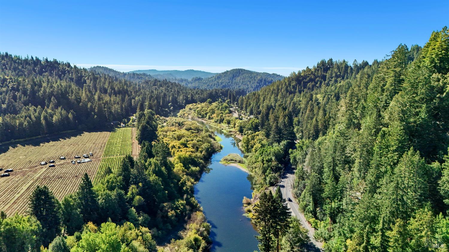 14571 Canyon 1 Road Guerneville, CA 95446 - Photo 36 of 37 a view of a lake in middle of the forest