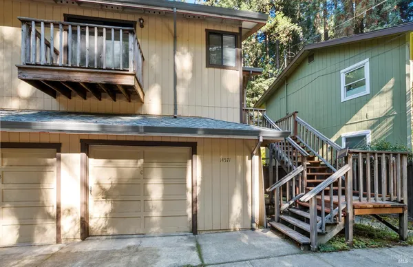 a view of front door and deck