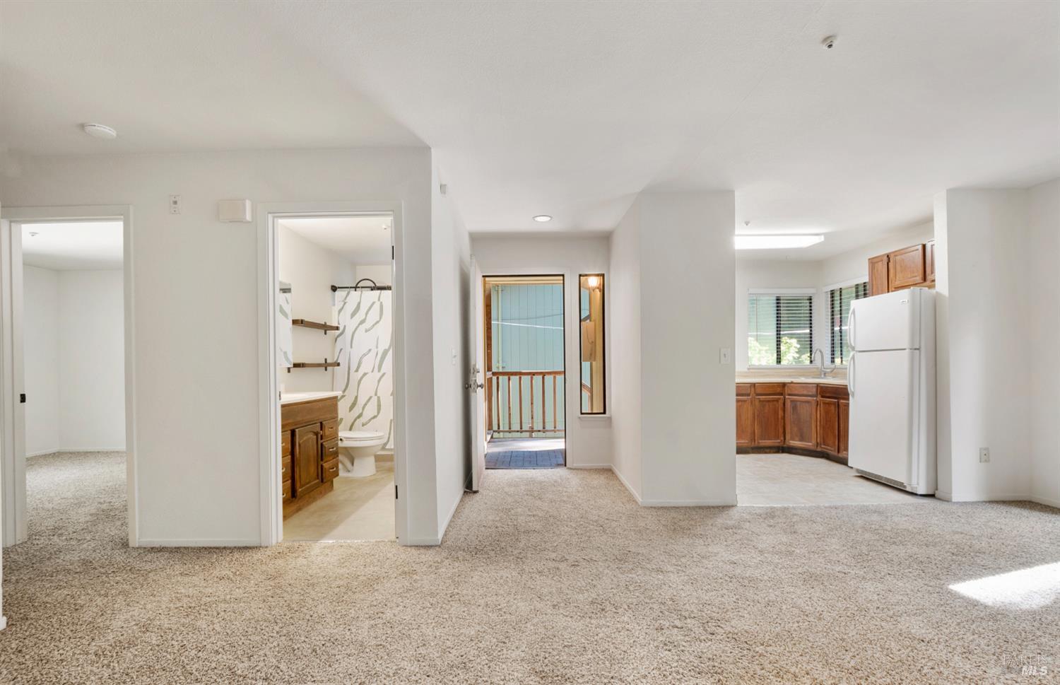14571 Canyon 1 Road Guerneville, CA 95446 - Photo 9 of 37 a view of a livingroom with a furniture and a refrigerator