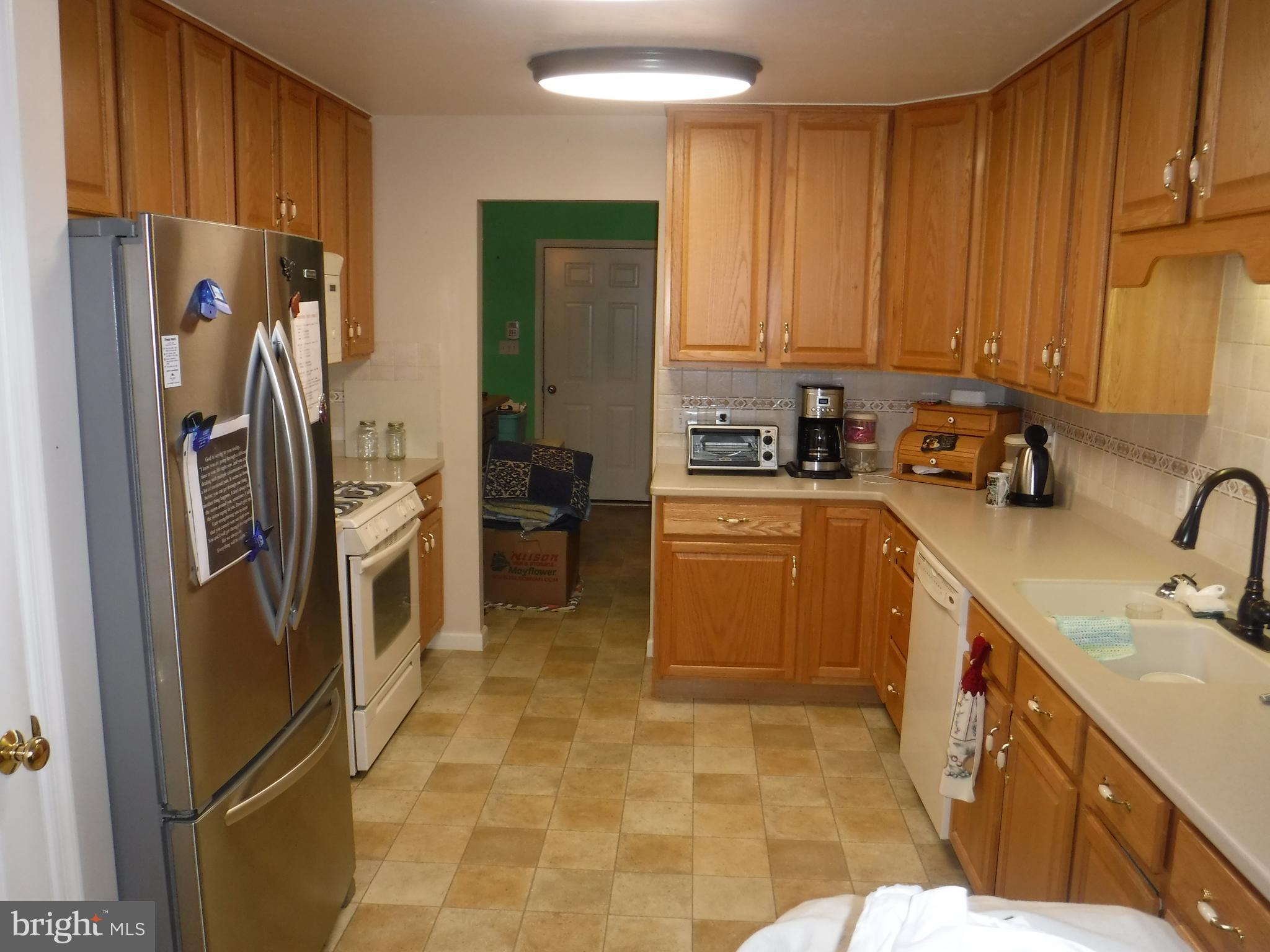 6825 Seneca Ridge Drive York, PA 17403 - Photo 5 of 19 Kitchen with Pantry Closet