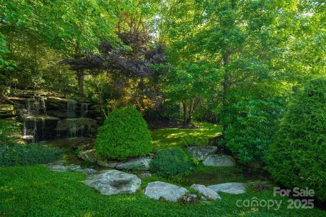 a backyard of a house with lots of green space