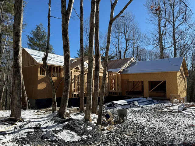 a view of an empty room with a balcony