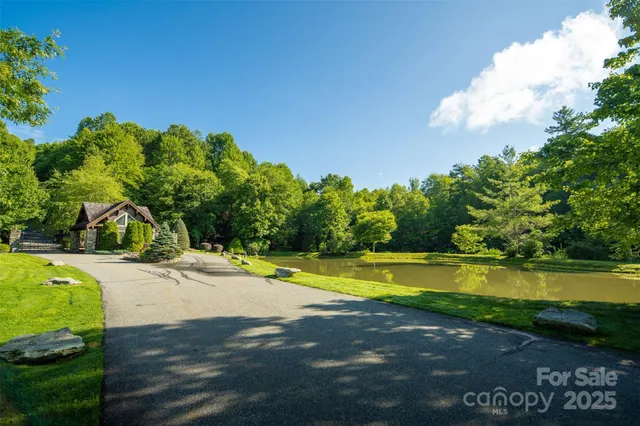 a view of a swimming pool with an outdoor space and seating area