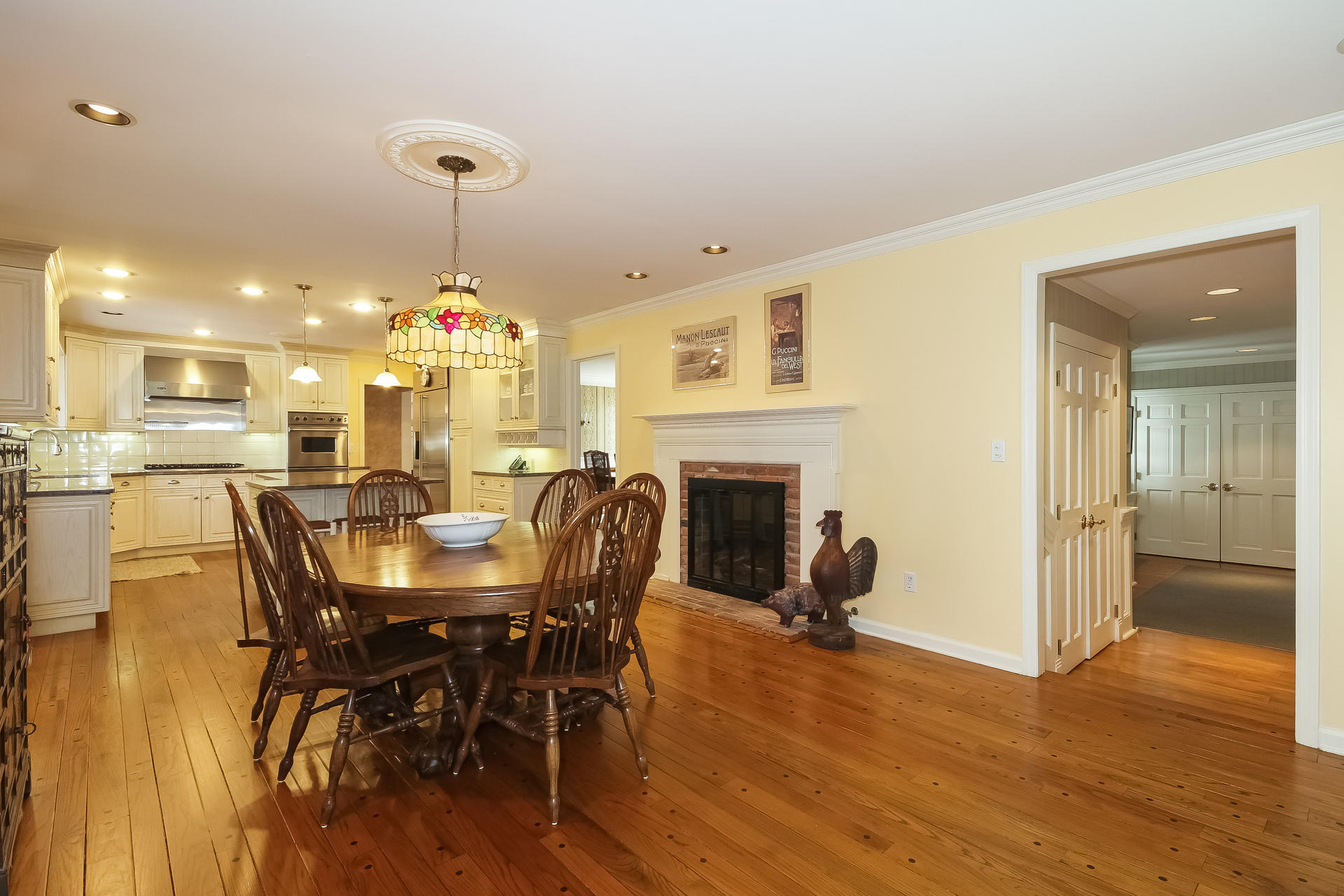 447 Valley Road New Canaan, CT 06840 - Photo 12 of 49 a view of a dining room with furniture and wooden floor