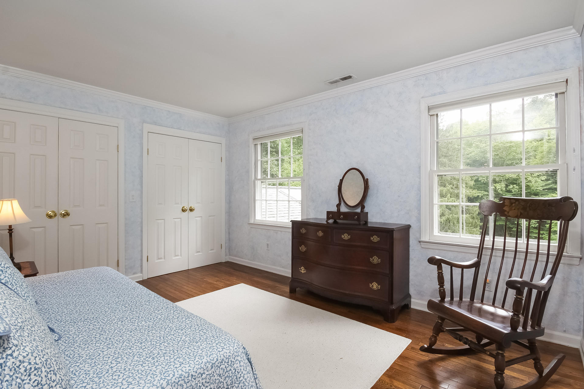 447 Valley Road New Canaan, CT 06840 - Photo 27 of 49 a bedroom with a bed and a window