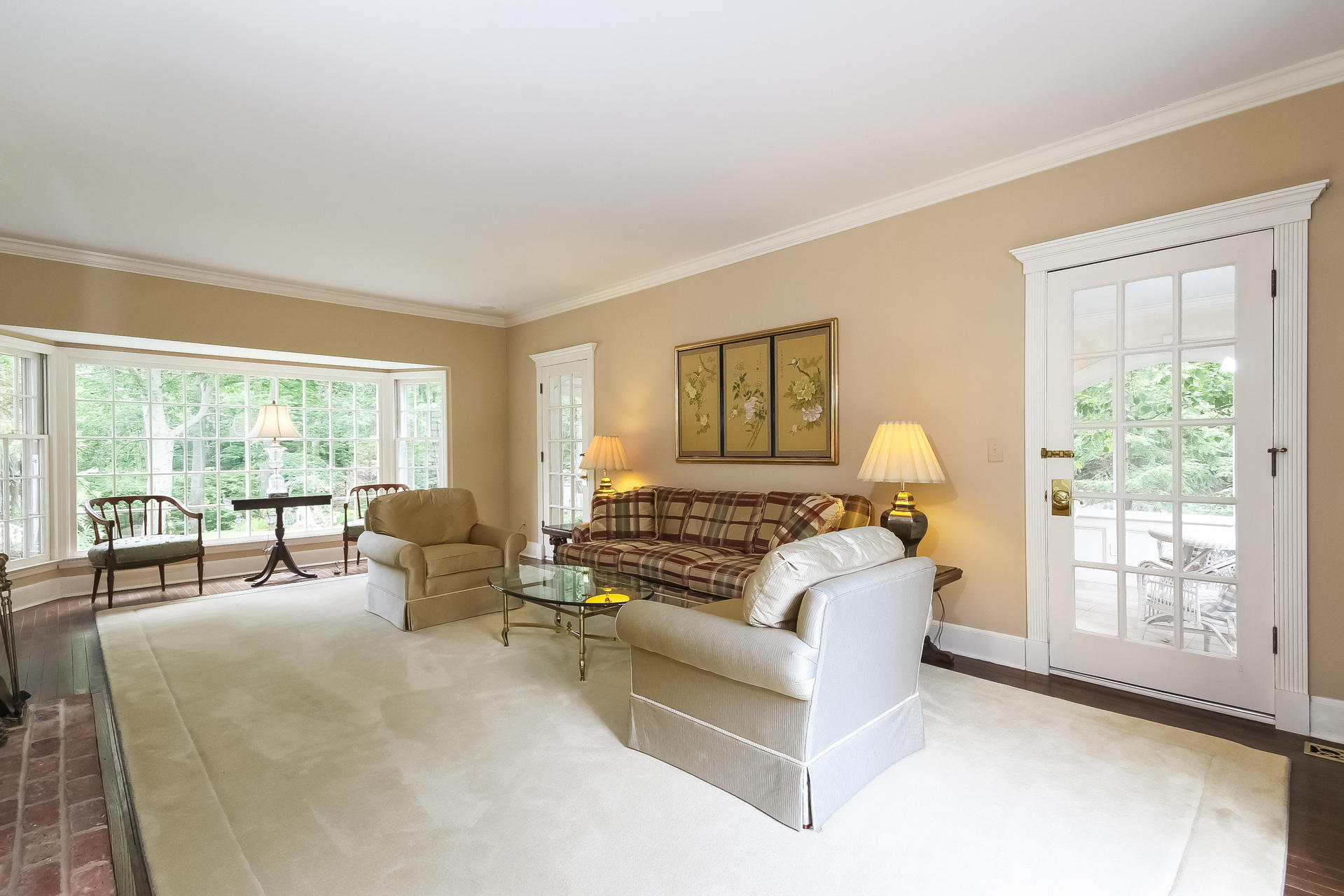 447 Valley Road New Canaan, CT 06840 - Photo 8 of 49 a living room with furniture and a large window with outer view