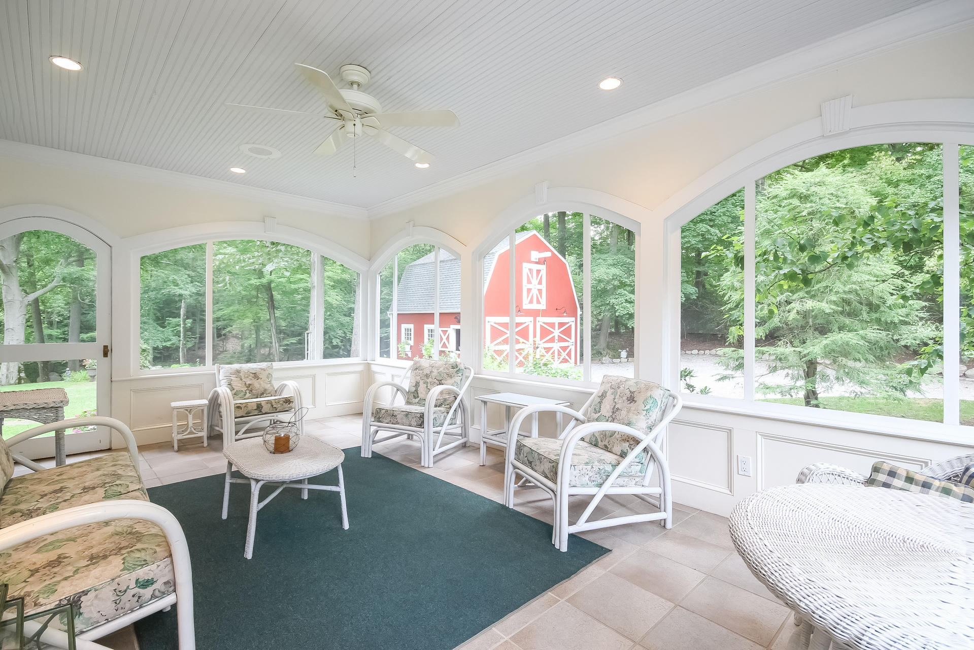 447 Valley Road New Canaan, CT 06840 - Photo 9 of 49 a living room with furniture and a large window