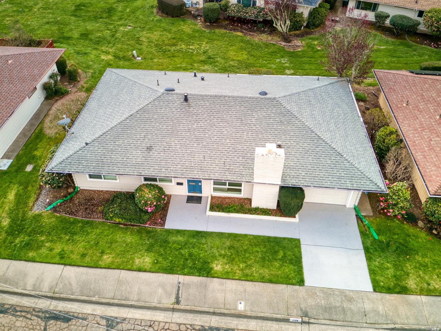 328 Green Field Circle Santa Rosa, CA 95409 - Photo 1 of 1 an aerial view of a house with a yard