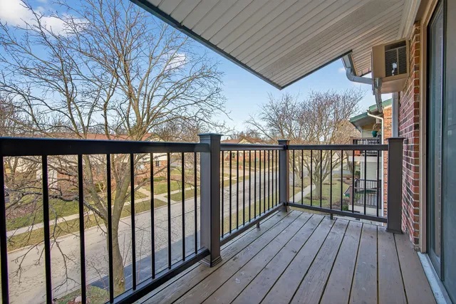 a view of a wooden street from a balcony