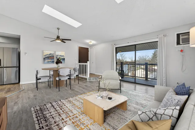 a living room with furniture and a table