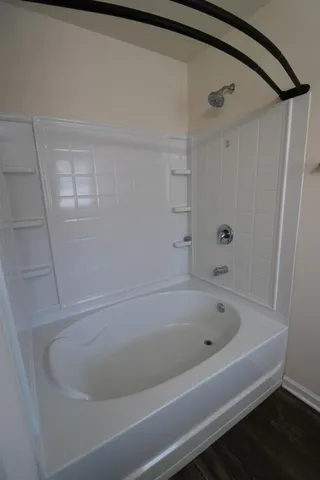 a bathroom with a bathtub