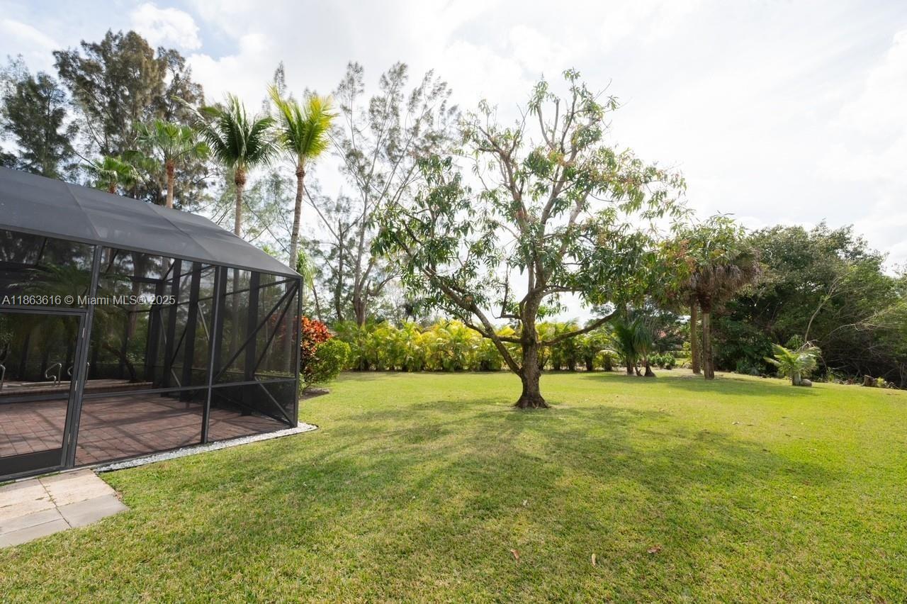 17969 Fairoaks Way Boca Raton, FL 33498 - Photo 22 of 24 a view of an outdoor space and tennis court