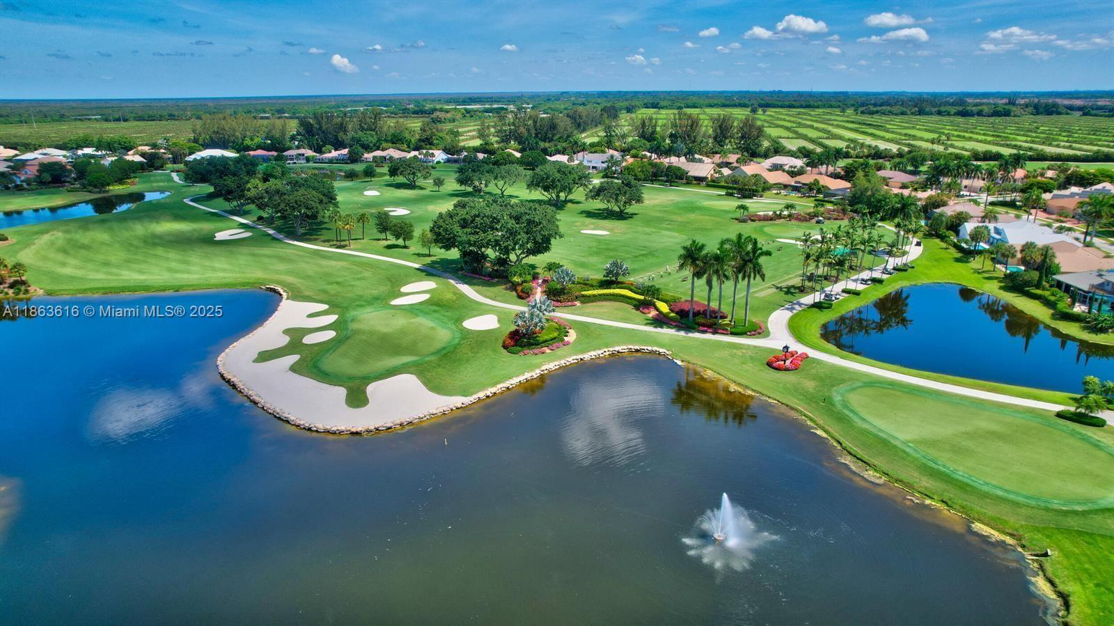 17969 Fairoaks Way Boca Raton, FL 33498 - Photo 3 of 24 a view of a golf course with a lake