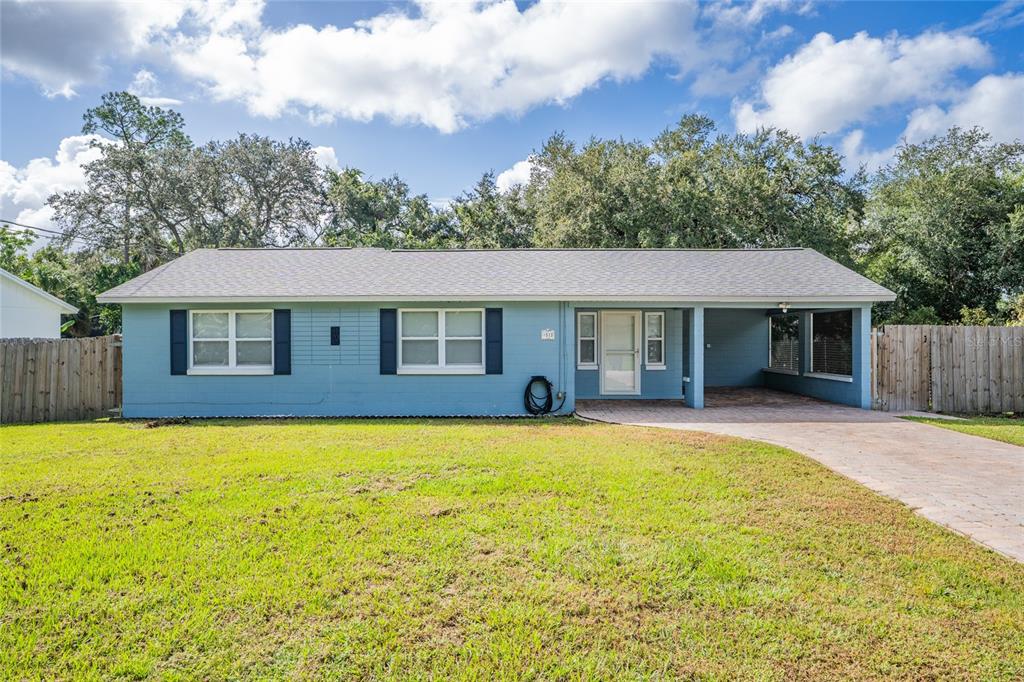 313 Riviera Drive DeBary, FL 32713 - Photo 1 of 1 a front view of a house with yard patio and swimming pool