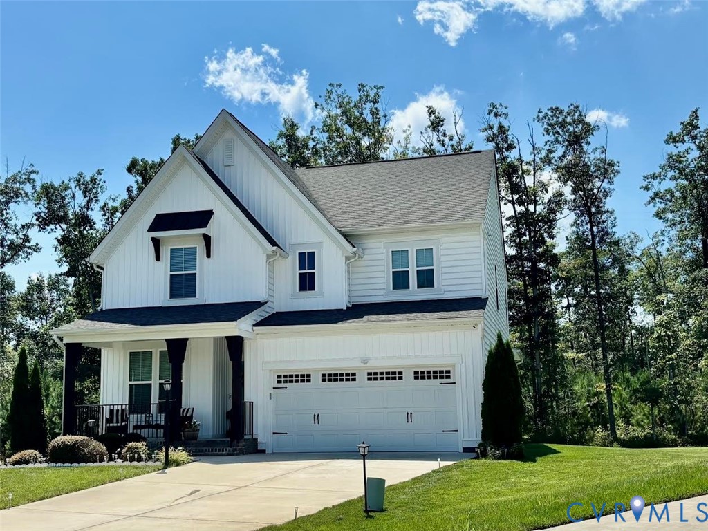 7507 Rouseaux Circle Chesterfield, VA 23832 - Photo 1 of 37 White board and batten siding with dark trim accen