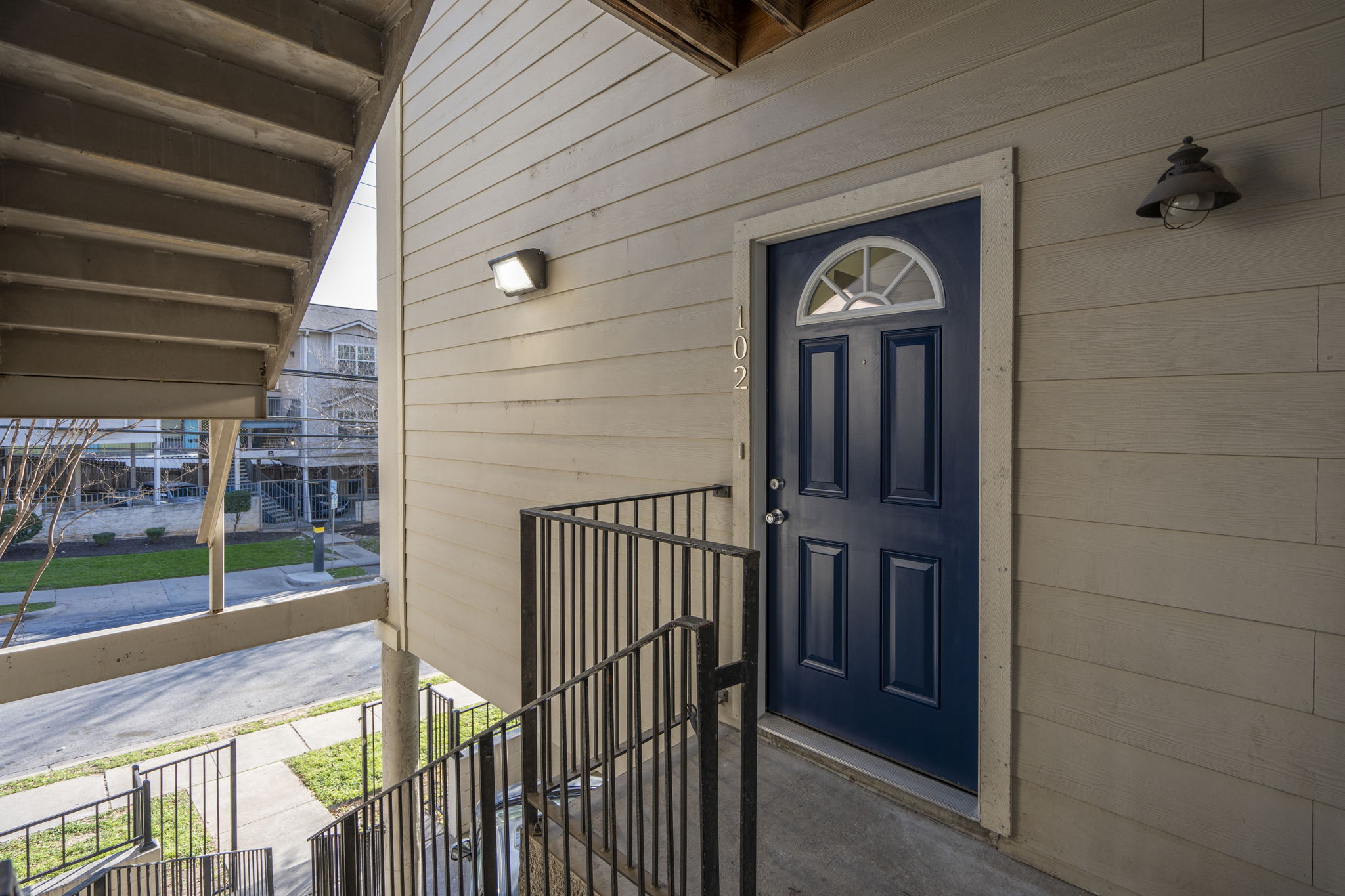 1100 West 25th Street, Unit 101 Austin, TX 78705 - Photo 5 of 39 a view of a house with a porch