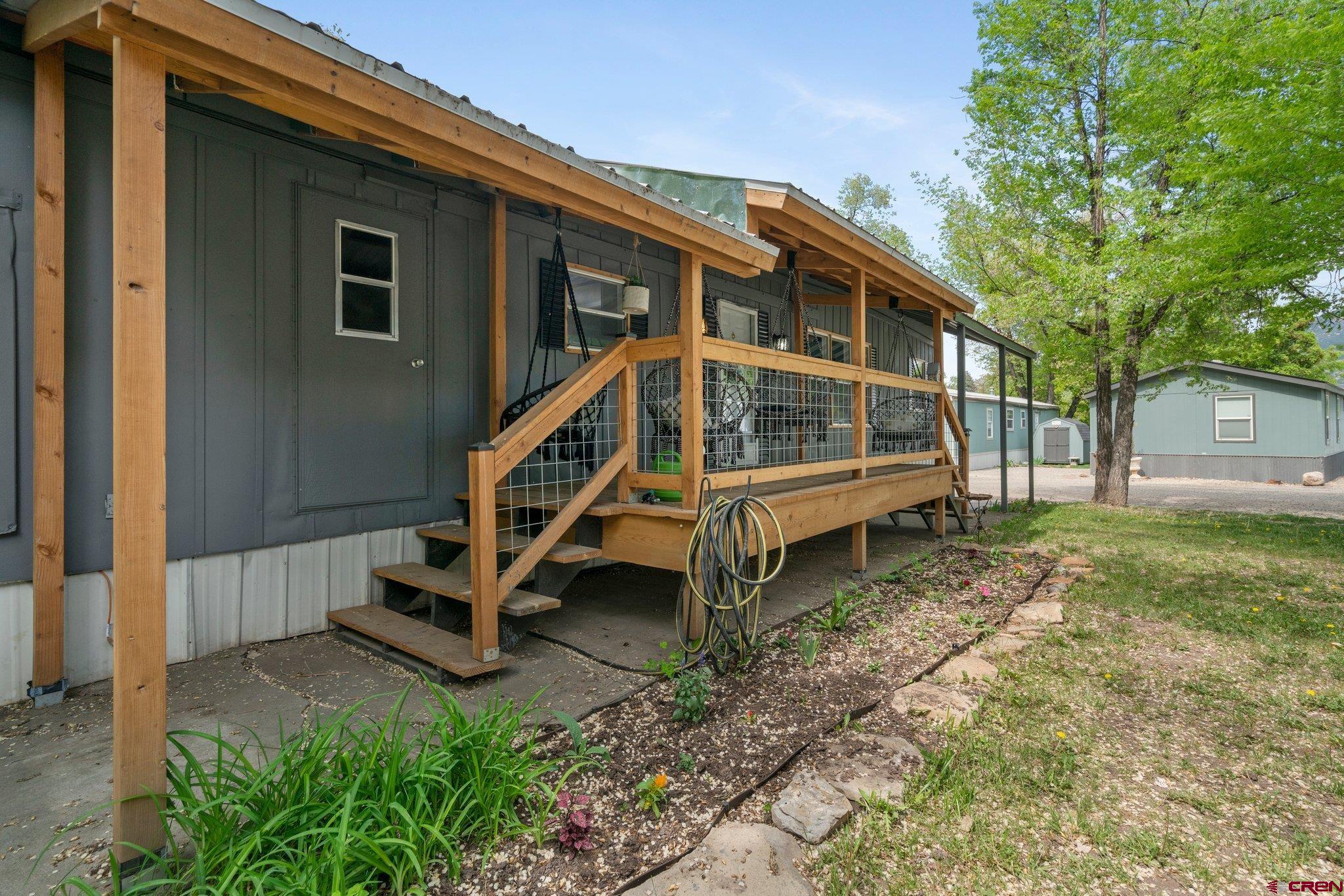 485 Florida Road, Unit D6 Durango, CO 81301 - Photo 1 of 35 a view of a house with a yard