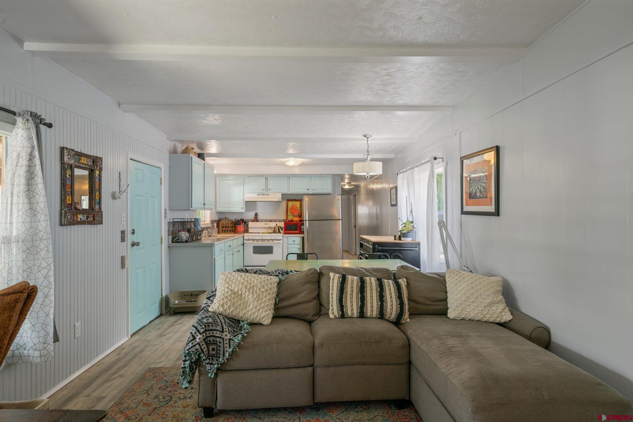 485 Florida Road, Unit D6 Durango, CO 81301 - Photo 12 of 35 a living room with furniture and a couch