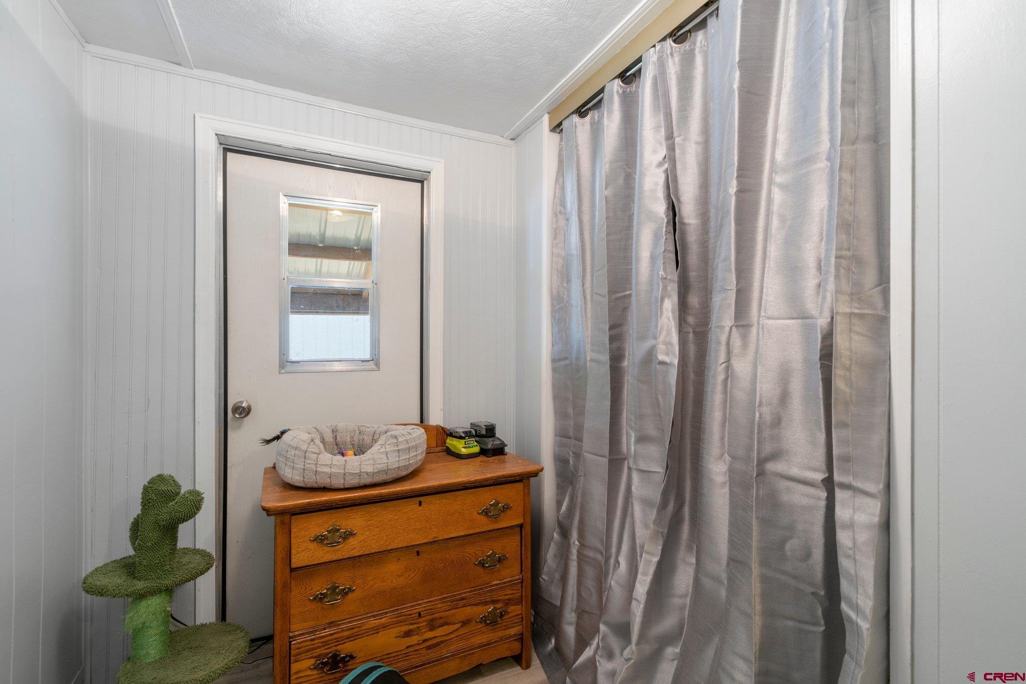 485 Florida Road, Unit D6 Durango, CO 81301 - Photo 18 of 35 a bathroom with a granite countertop sink and a mirror