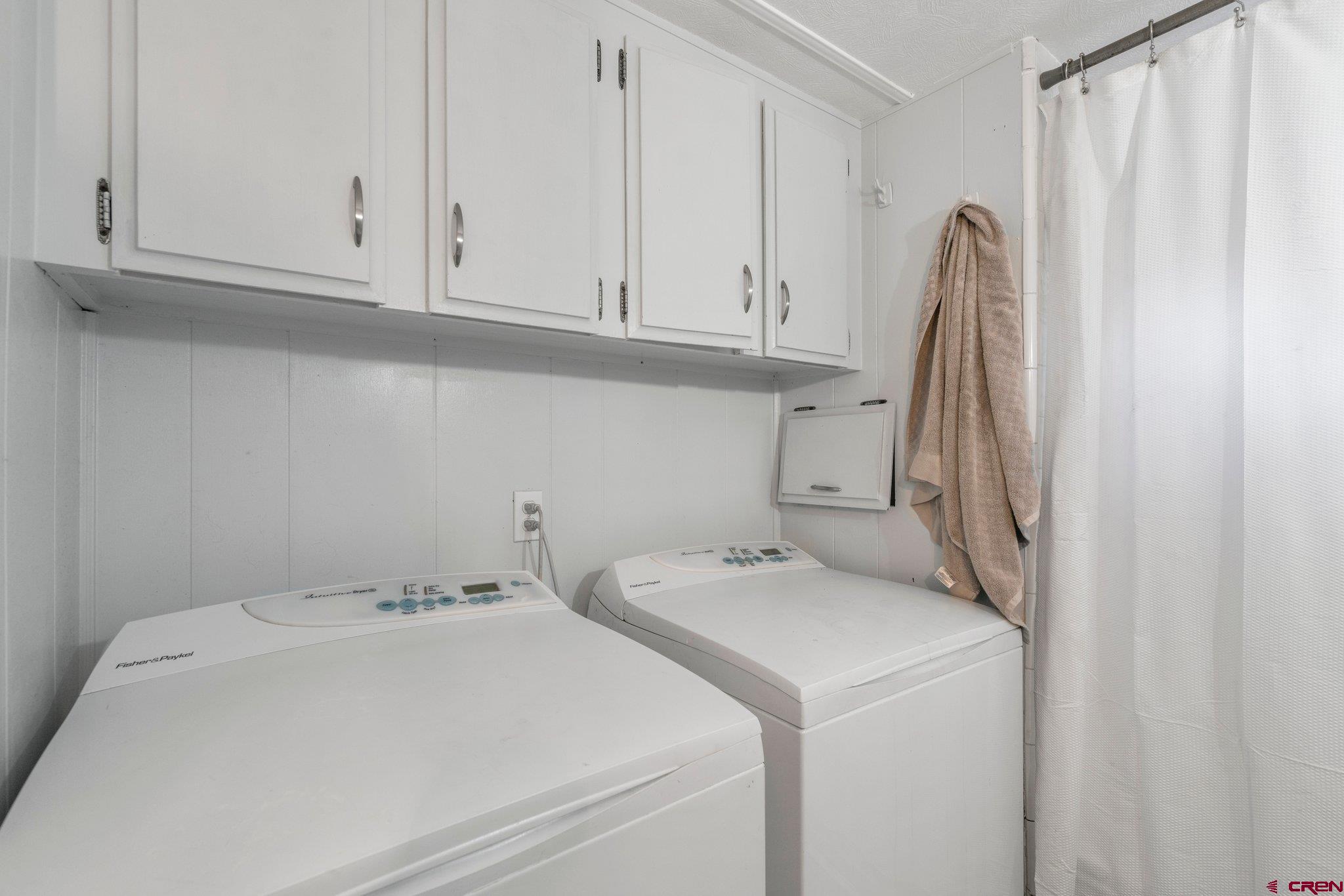 485 Florida Road, Unit D6 Durango, CO 81301 - Photo 19 of 35 a utility room with dryer and washer