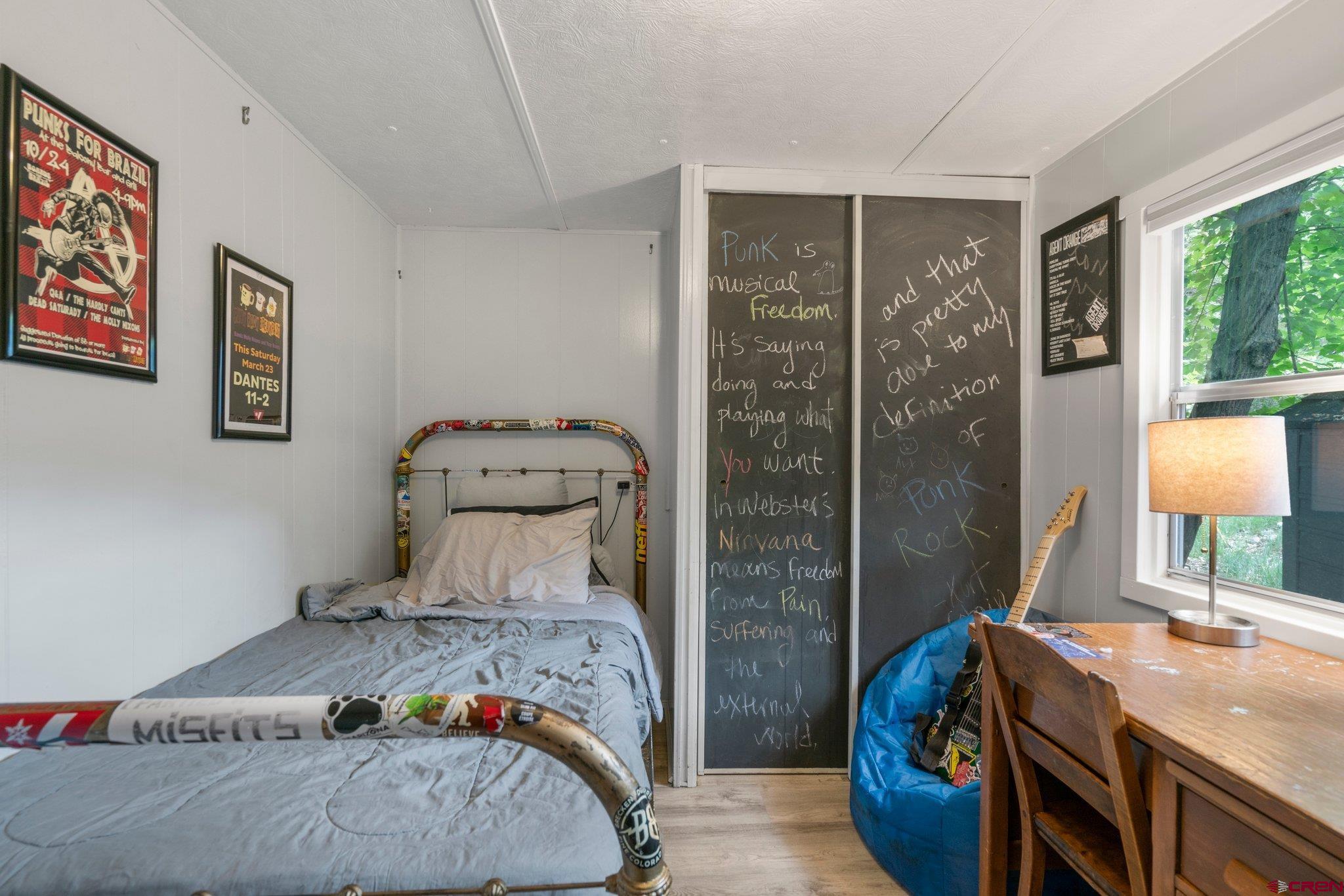 485 Florida Road, Unit D6 Durango, CO 81301 - Photo 20 of 35 a bedroom with a bed and a window