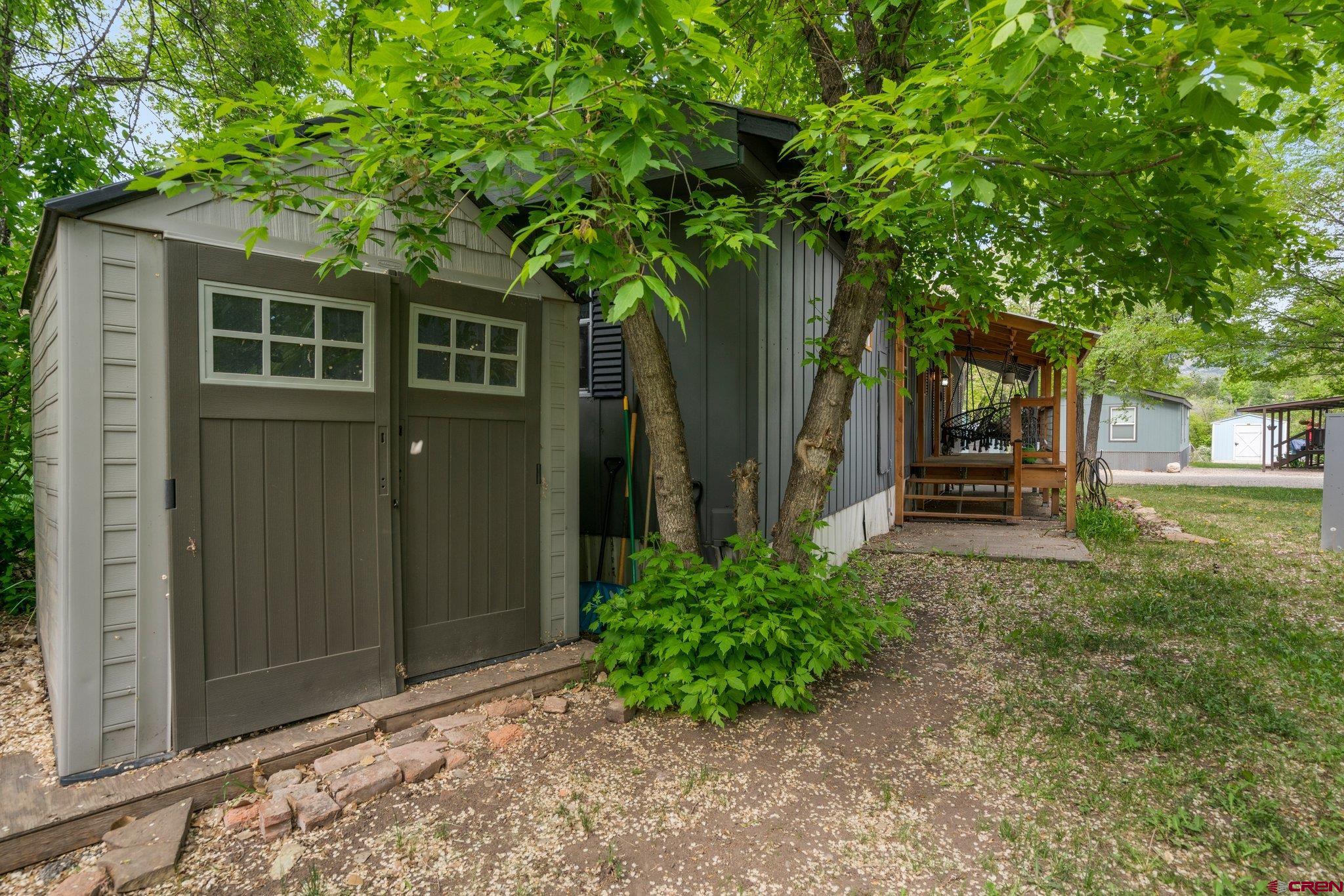 485 Florida Road, Unit D6 Durango, CO 81301 - Photo 25 of 35 a front view of a house with garden