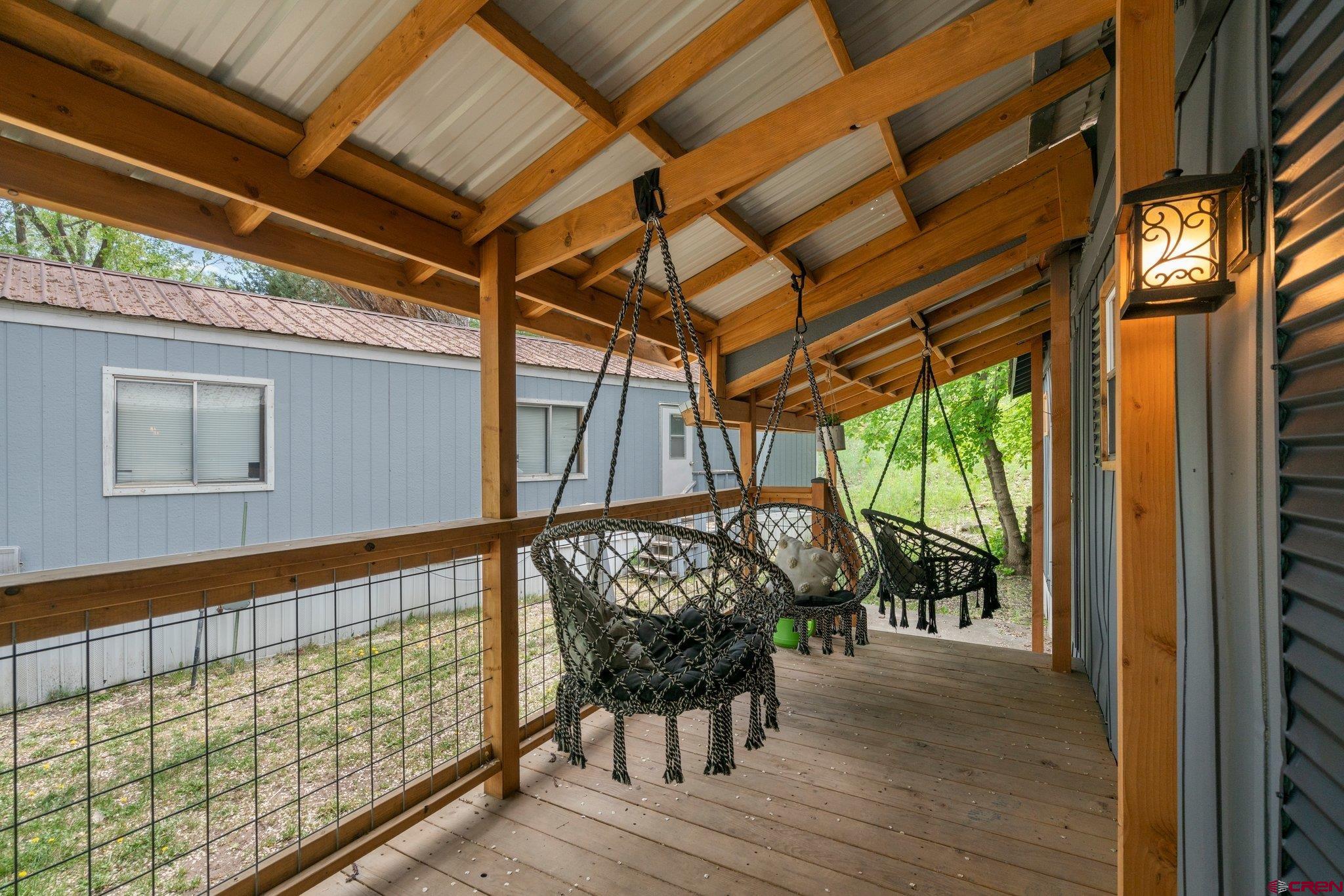 485 Florida Road, Unit D6 Durango, CO 81301 - Photo 26 of 35 a view of two chairs in the balcony