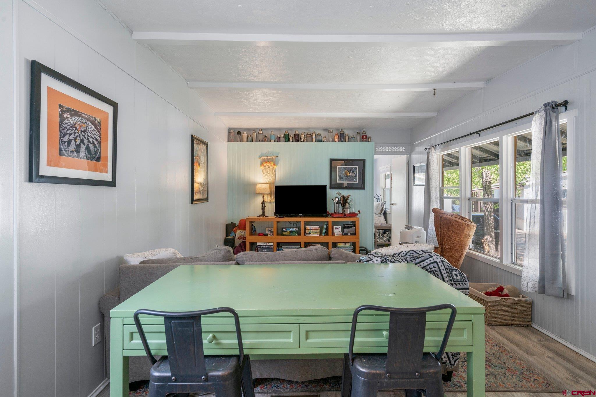 485 Florida Road, Unit D6 Durango, CO 81301 - Photo 3 of 35 a living room with furniture and a flat screen tv